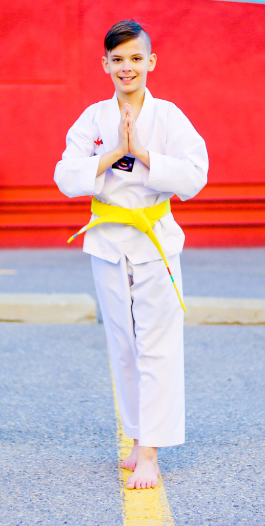 kid-doing-taekwondo-outside